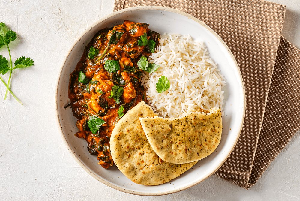 Kip tikka masala met rijst en naan